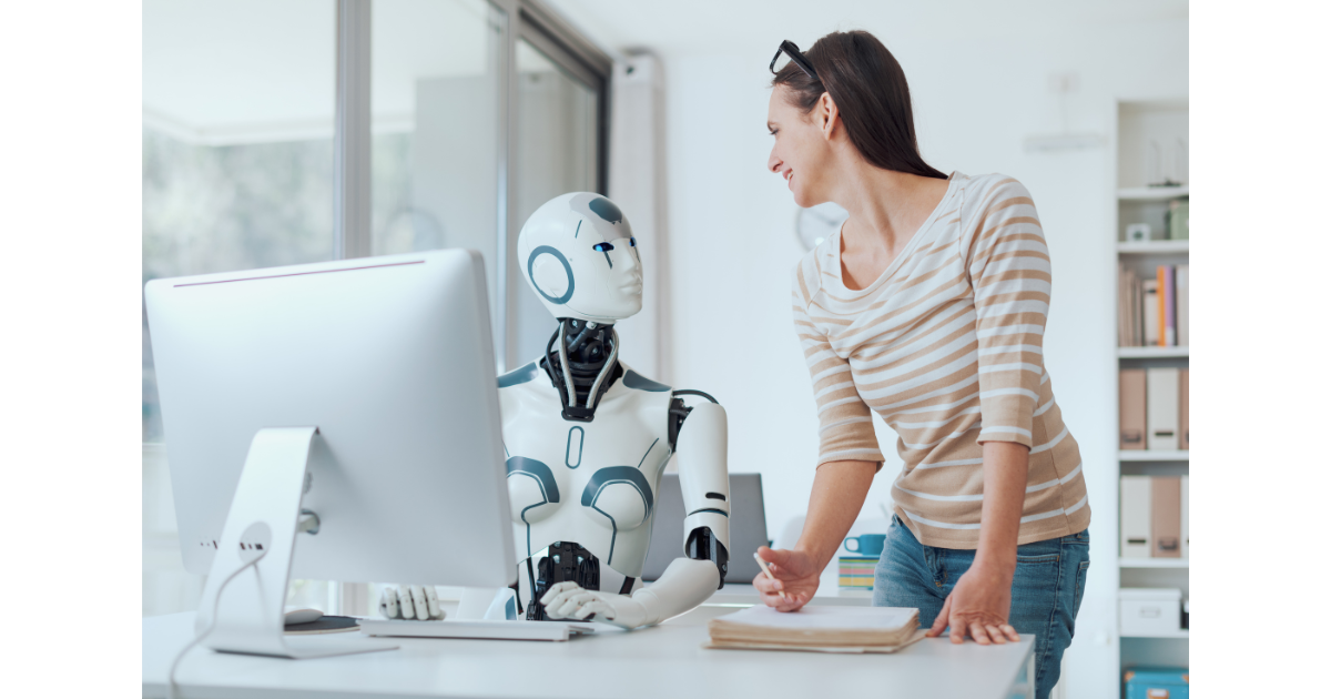 Woman working with robot, representing ai agent