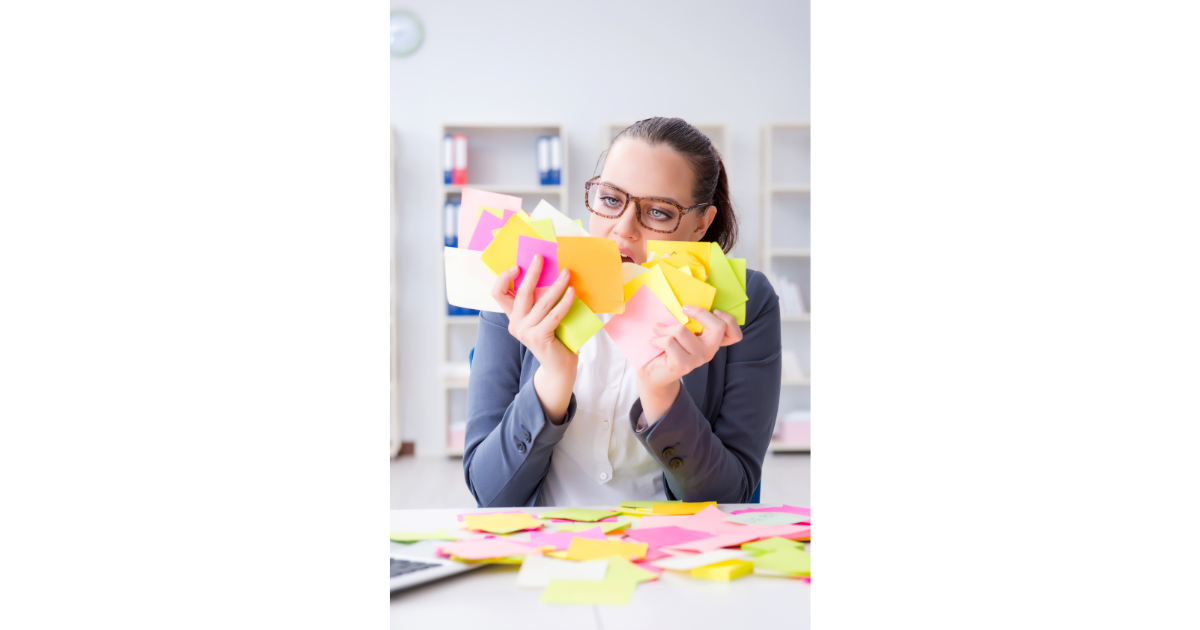 Woman overwhelmed with sticky notes