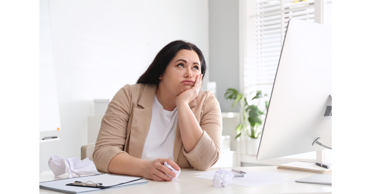 Bored woman at computer